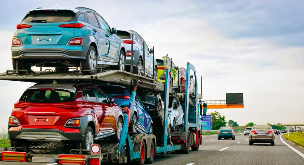 cars carrier truck road highway transporter logistics work trailer with cargo car drive delivery transport export industry heavy hauler haul vehicle auto haulage