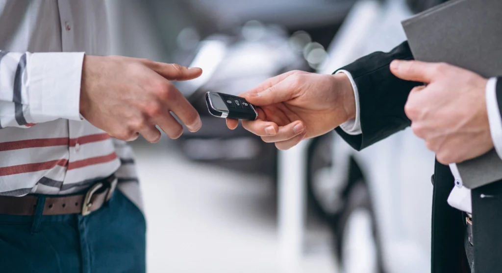 female hands close-up with car keys